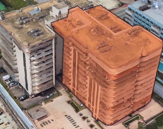 An infrared aerial view of a building with a brown roof.